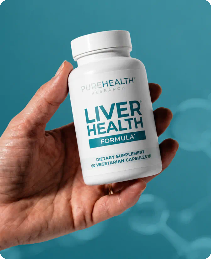 Hand holding Liver Health Formula bottle